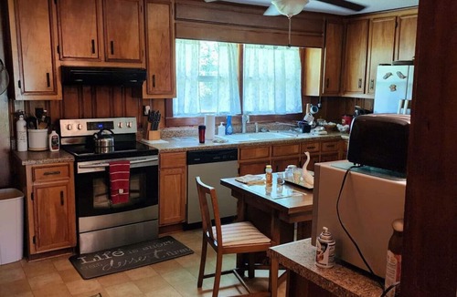 Hubert House | Mid-Century Country Home, nice front porch and east west split bedroom suites.