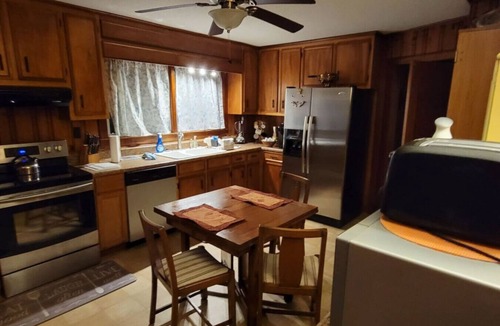 Hubert House | Mid-Century Country Home, nice front porch and east west split bedroom suites.