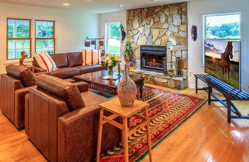 Hendersonville House | Modern and spacious home surrounded by scenic willow trees.
