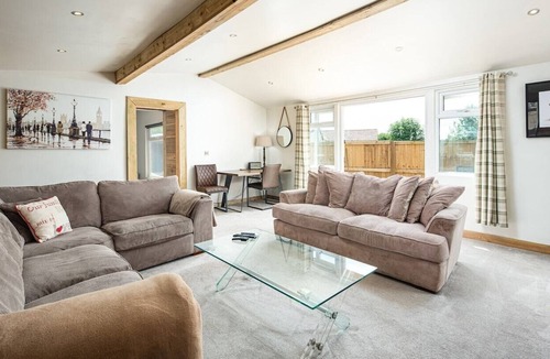 Upton Cheyney Cabin | Modern cabins with gorgeous lounge & sunny deck sleeps 18