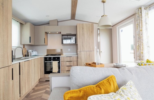 Selsey House | Modern, stylish and spacious 12ft-wide caravan with one double and one twin.