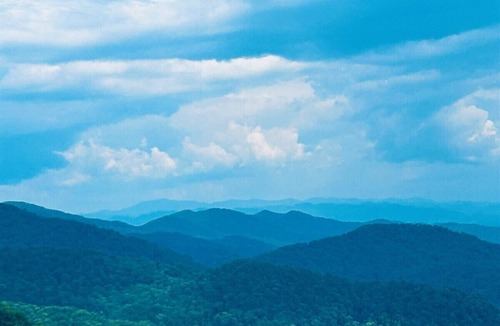 Asheville Cabin | Mountain cabin with 3 bedrooms, 2 baths, fire pit, porch swing.