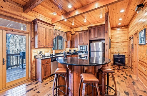 Tuckasegee House | Mountain cabin with wrap-around balcony, games, fireplace, & children's items