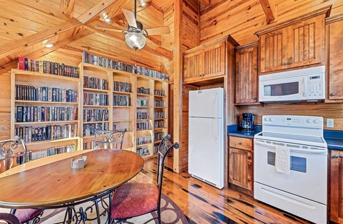 Tuckasegee House | Mountain cabin with wrap-around balcony, games, fireplace, & children's items
