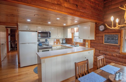 Lansing Cabin | Mountain Top Cabin! Hot tub + Fireplace + Dog Friendly