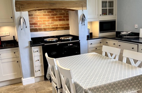 Newport House | Multi-award winning Georgian Farmhouse, village location, short walk to beach