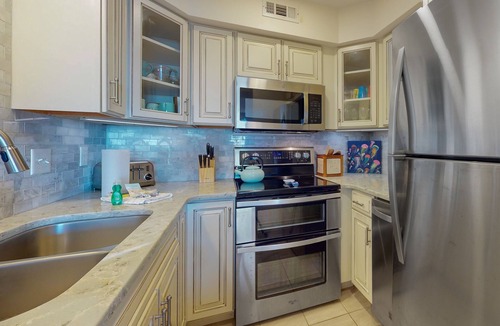 Pine Knoll Shores Condo | Multi-level, oceanfront condo with WiFi, W/D, & community pool/tennis courts