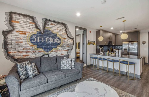 Rolling Mill Hill Condo | Muse | Rockstar downtown condo with private balcony, central AC & gym