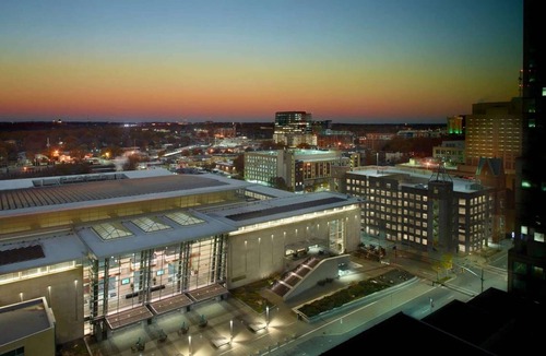 Downtown House | Near Red Hat Amphitheater + Dining. Pool. Gym.