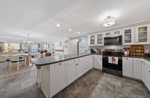 Kure Beach Condo | Nestled Inn, Ocean front at Kure Beach, elevator, 3 pools