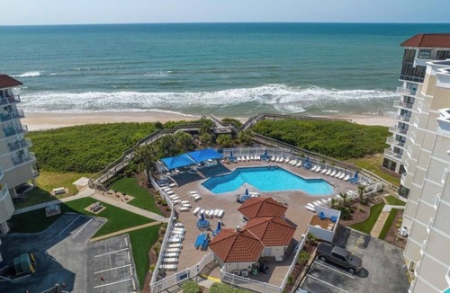 McCutcheon Field Condo | ☀️NEW☀️ Beachfront 2BR 2BA with Heated Pool, Playground, Gym, and Arcade!