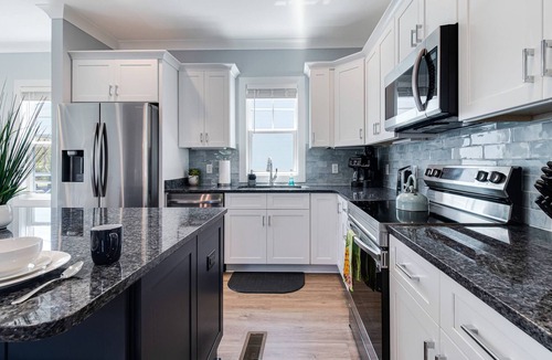 Tranquil Harbour House | New gorgeous home with Pool, New 8 seater Golf Cart, elevator, with easy access to beach