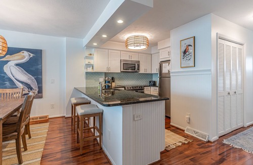 Kure Beach Condo | New Listing Beachfront Condo with Indoor/Outdoor Pools, Gym & Tennis
