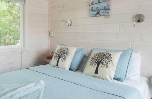Steele Creek Cabin | New Waterfront Cabin on the Large Sundeck #20 by RedAwning