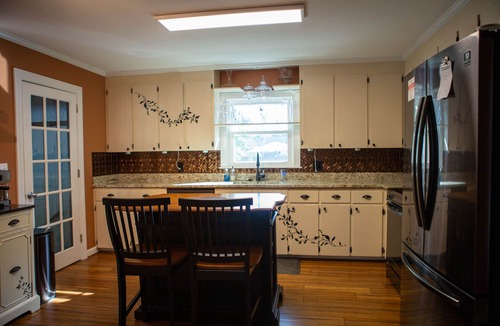 Wilmington House | Oasis in the middle of town for large groups with pool and 2 Master bedrooms.