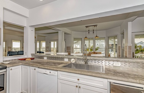 Flora's Bluff House | Ocean front home, access to both clubs and large porches! Breaking Point