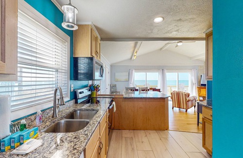 Frisco House | Oceanfront home w/elevator, private hot tub, shared pool, beach access, & WiFi