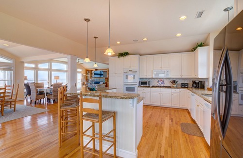 Carolina Dunes House | Oceanfront home with private heated pool complete with swim up bar and in-pool seating