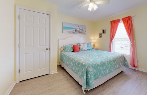 Surf City Condo | Oceanview condo located within walking distance to the beach!