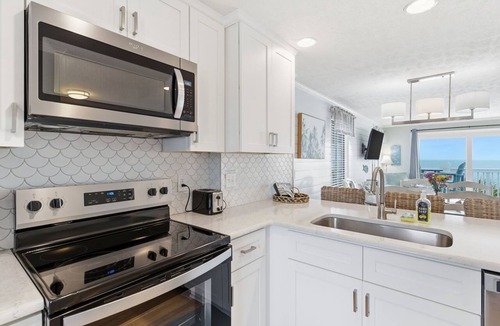 Kure Beach Condo | OD 2103C Top Floor Oceanfront Condo, elevator, Indoor/Outdoor Pools