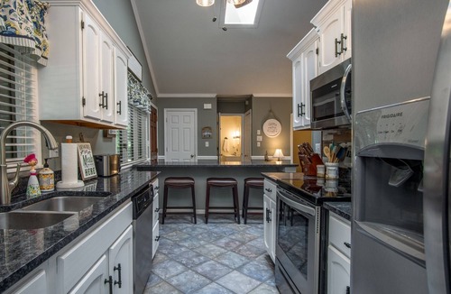 Brevard House | On Golf course, near pool, screened porch split bedroom plan