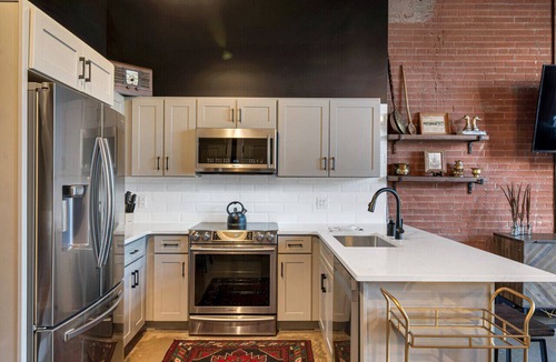 Nashville Condo | One-Of-A-Kind! Roll Up Garage Door, Pool, Speakeasy