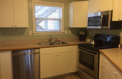 Colington Condo | Oyster Pointe Soundside Large Deck Overlooks Pool