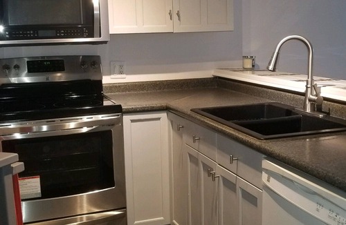 North Carolina Coast Condo | Partial ocean view. 6 min walk to beach. 1.5 baths: great beds, linens inc.