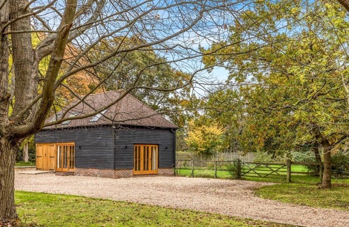Funtington House | Pass the Keys | Peaceful woodland lodge with two bedrooms