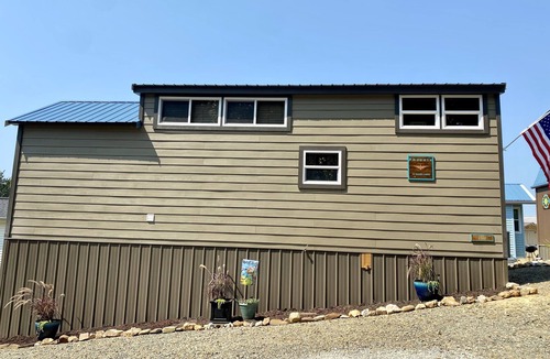 New London House | Phoenix Tiny House at Badin Shores Resort, lake view, porch, pool, beach, marina