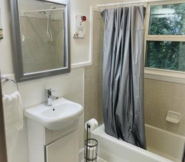 Enderly Park Apartment | Plaid Pad - Stylish Retreat 12 min to Airport & Downtown