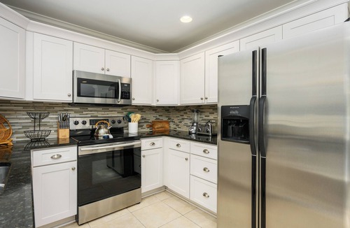 Lawton Woods House | Pool heat included April 11 - May 30, and 4 beach cruiser bikes, too!