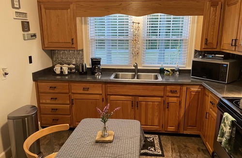New Hill House | Private, cozy cottage, and beautiful country setting surrounded with pine trees.