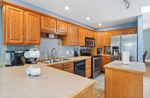 Terrell House | Private dock, hot tub, game room, paddle boat & fire pit!