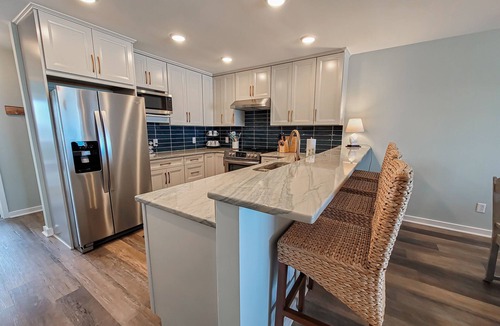 Topsail Beach Condo | Queen's Grant E-116 – Oceanfront Serenity Awaits