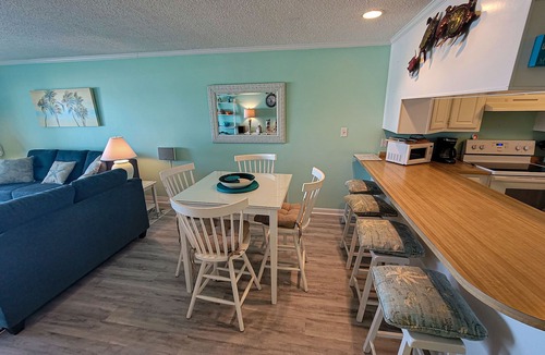 Topsail Beach Condo | Queens Grant A-103 – Ocean Views & Cozy Comfort
