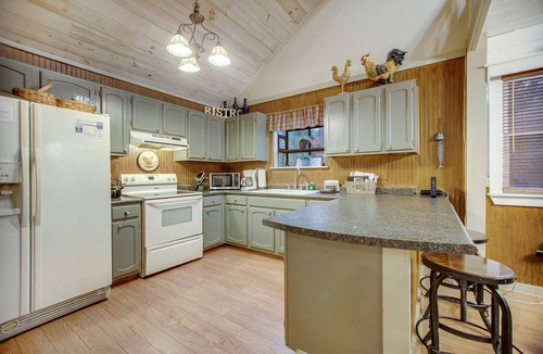 Cullowhee Cottage | Quiet dog-friendly riverfront house with large back deck, hot tub, fireplace