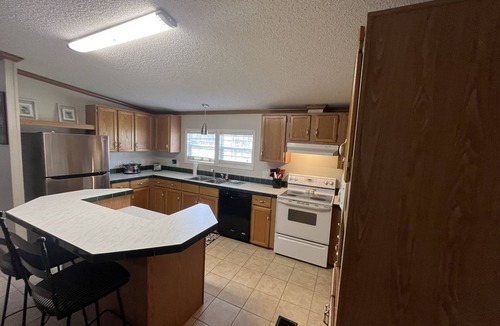 King House | Quiet., Large home on 2 acre estate that can host large groups close to town.