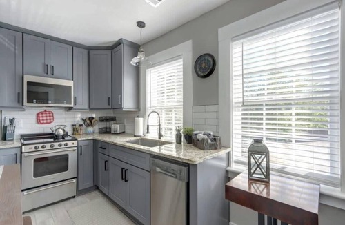 Old West Broad Neighborhood Apartment | Red Brick Row, Modern | Inviting | Chic
