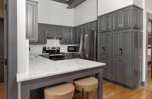 Old West Broad Neighborhood Condo | Refurbished Townhome | Walk to Forsyth & Parking