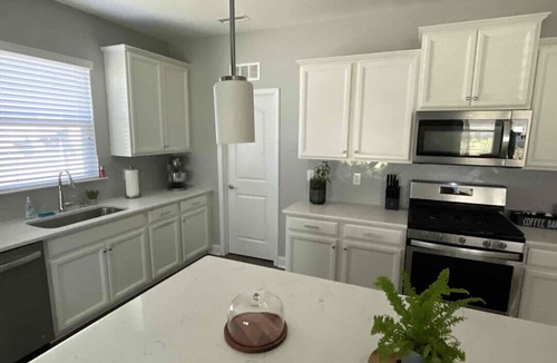 Fuquay-Varina House | Relax and enjoy this beautiful, modern home with a gourmet kitchen!