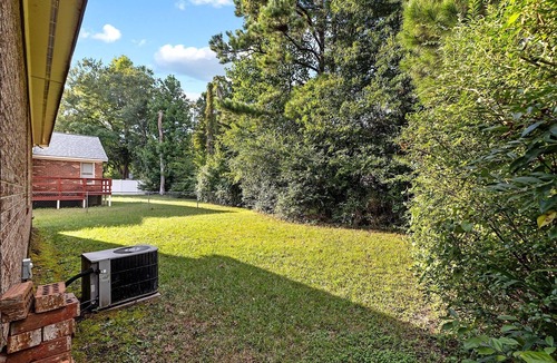 Pine Forest House | Relaxing Boho Bedroom in Superb Fayetteville Location