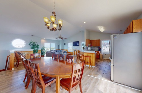 Wind Over Waves House | Renovated water-view house with private pool, hot tub, game room, & central AC