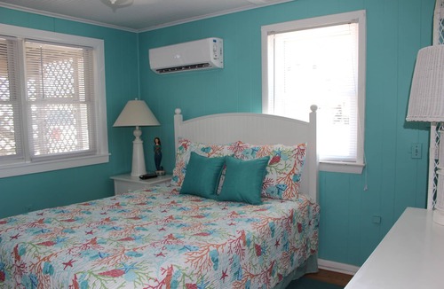 Nags Head Cottage | Rest easy steps away from the beach!