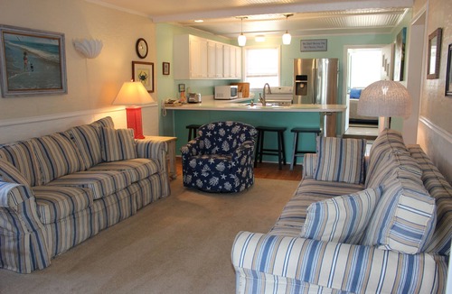 Nags Head Cottage | Rest easy steps away from the beach!