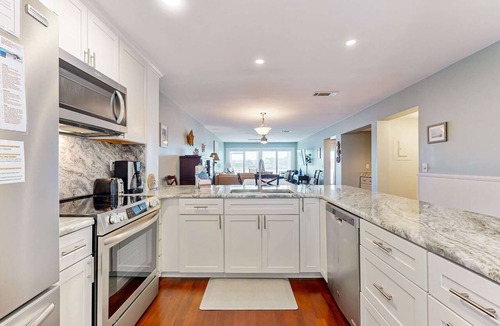 Folly Beach Condo | Riverfront condo near Folly Beach with balcony, views, outdoor pool & tennis