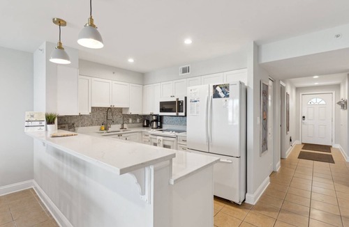 Folly Beach Condo | Riverfront condo, Screen porch - Short walk across bridge to beach, shops, and restaurants!