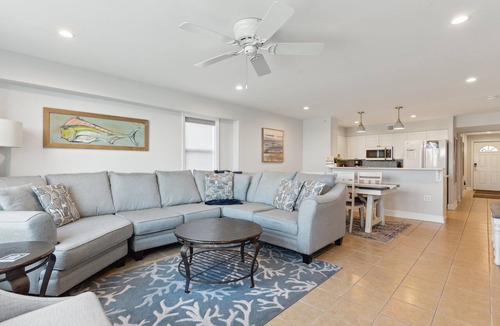 Folly Beach Condo | Riverfront condo, Screen porch - Short walk across bridge to beach, shops, and restaurants!