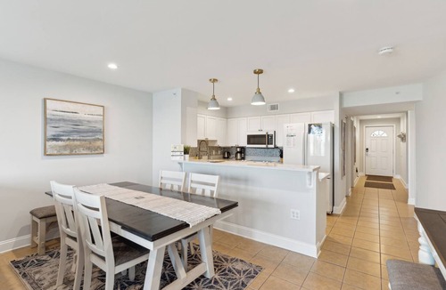Folly Beach Condo | Riverfront condo, Screen porch - Short walk across bridge to beach, shops, and restaurants!