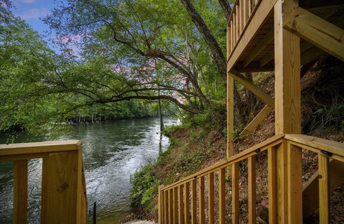 Broken Bow Cabin | riverfront with pool, game room, hot tub and kayaks- sleeps 10